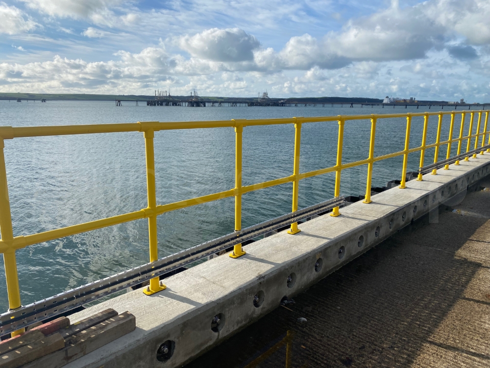 Interclamp two rail system installed on tug jetty